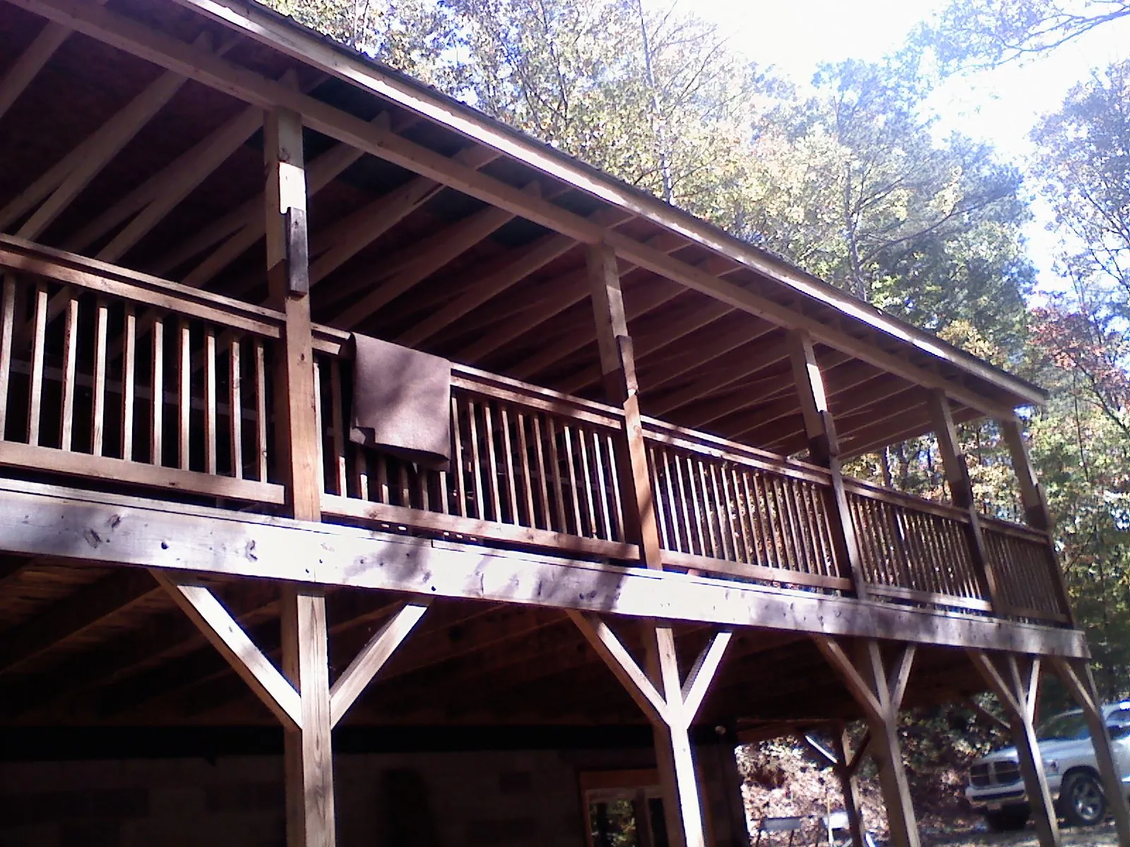Timber framing under a new elevated porch and deck — Roof Leak Repair in Mont Vernon by Roofing Brothers